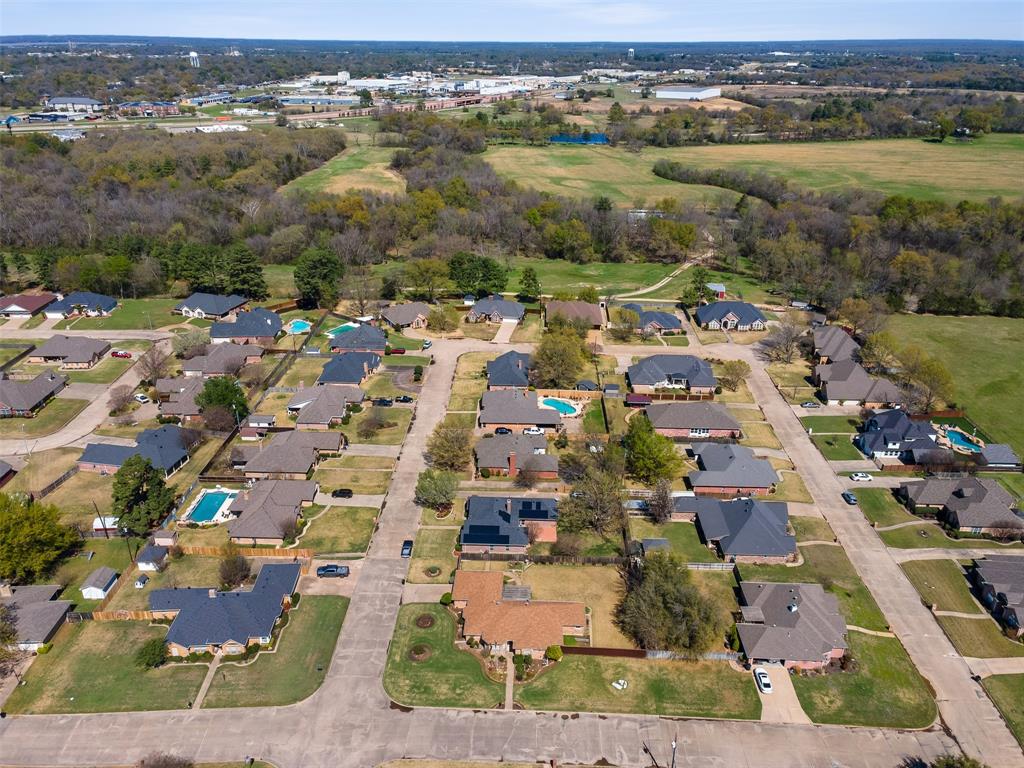 1516 Ryan Road Sulphur Springs, TX 75482 - Photo 37 of 37 an aerial view of residential houses with outdoor space