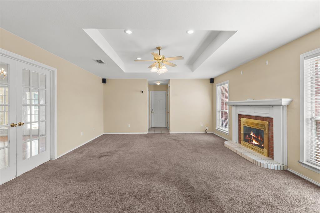 1516 Ryan Road Sulphur Springs, TX 75482 - Photo 10 of 37 a view of empty room with fireplace and fan