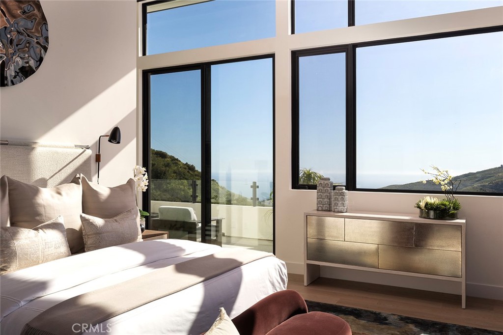 12530 Stagecoach Road Malibu, CA 90265 - Photo 14 of 45 a bedroom with a bed and a window