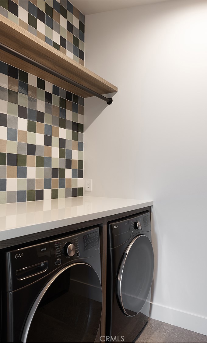 12530 Stagecoach Road Malibu, CA 90265 - Photo 28 of 45 a close view of a sink a washer and dryer