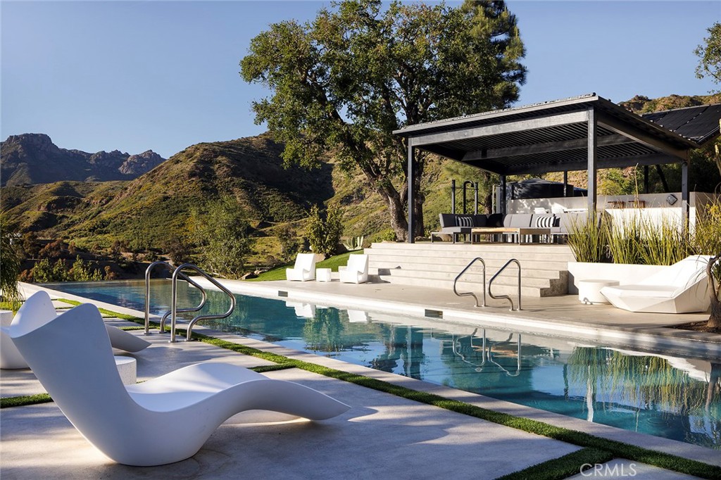 12530 Stagecoach Road Malibu, CA 90265 - Photo 30 of 45 swimming pool view with a seating space