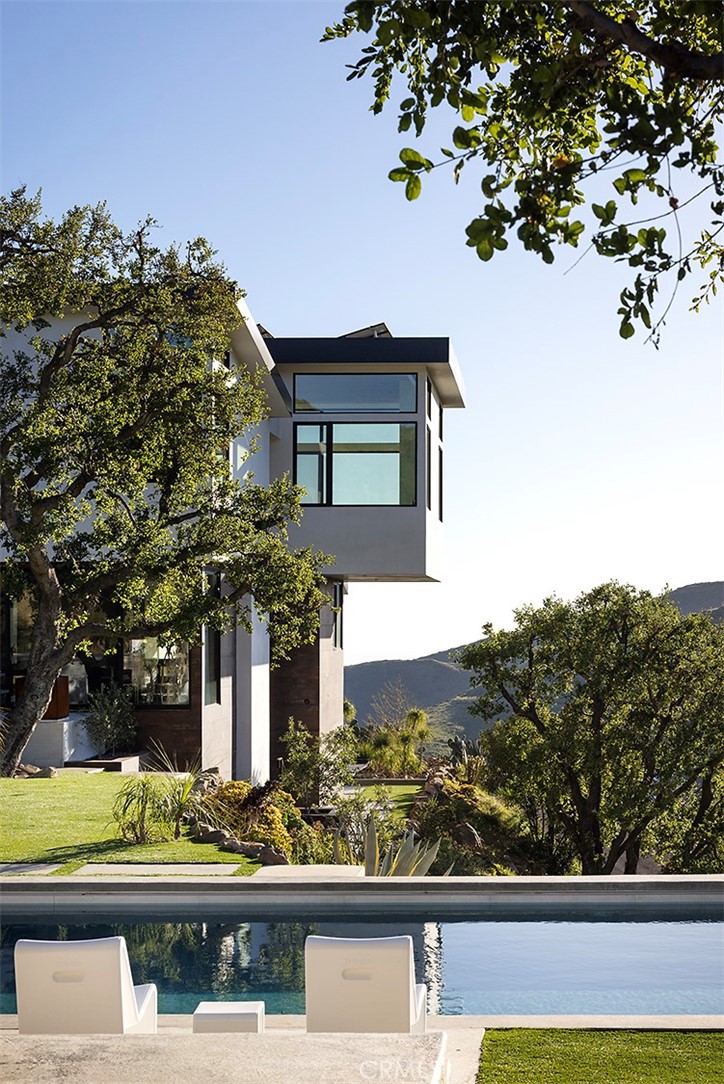 12530 Stagecoach Road Malibu, CA 90265 - Photo 33 of 45 a view of a wooden house with a outdoor space
