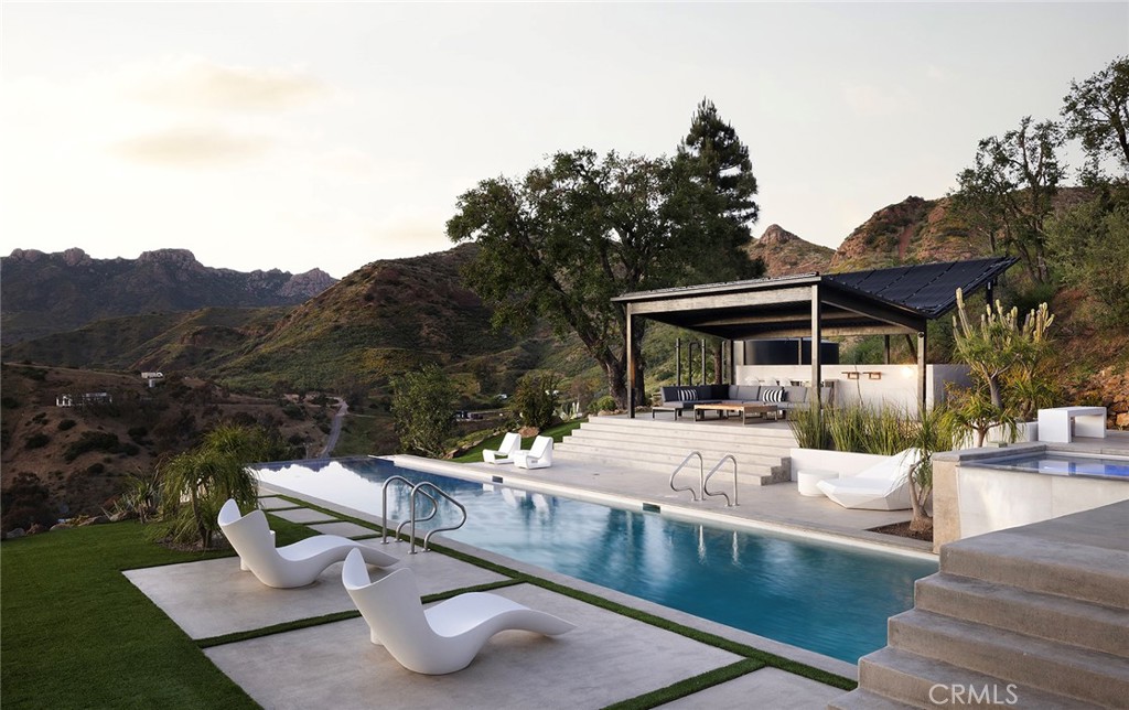 12530 Stagecoach Road Malibu, CA 90265 - Photo 40 of 45 a view of house with outdoor seating