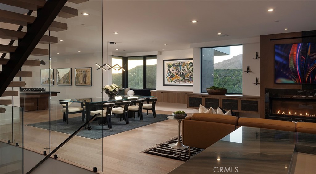 12530 Stagecoach Road Malibu, CA 90265 - Photo 43 of 45 a living room with fireplace furniture and a flat screen tv