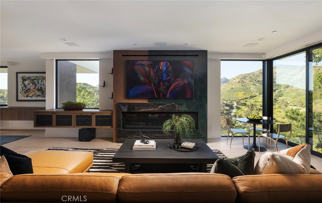 12530 Stagecoach Road Malibu, CA 90265 - Photo 6 of 45 a living room with furniture and a large window