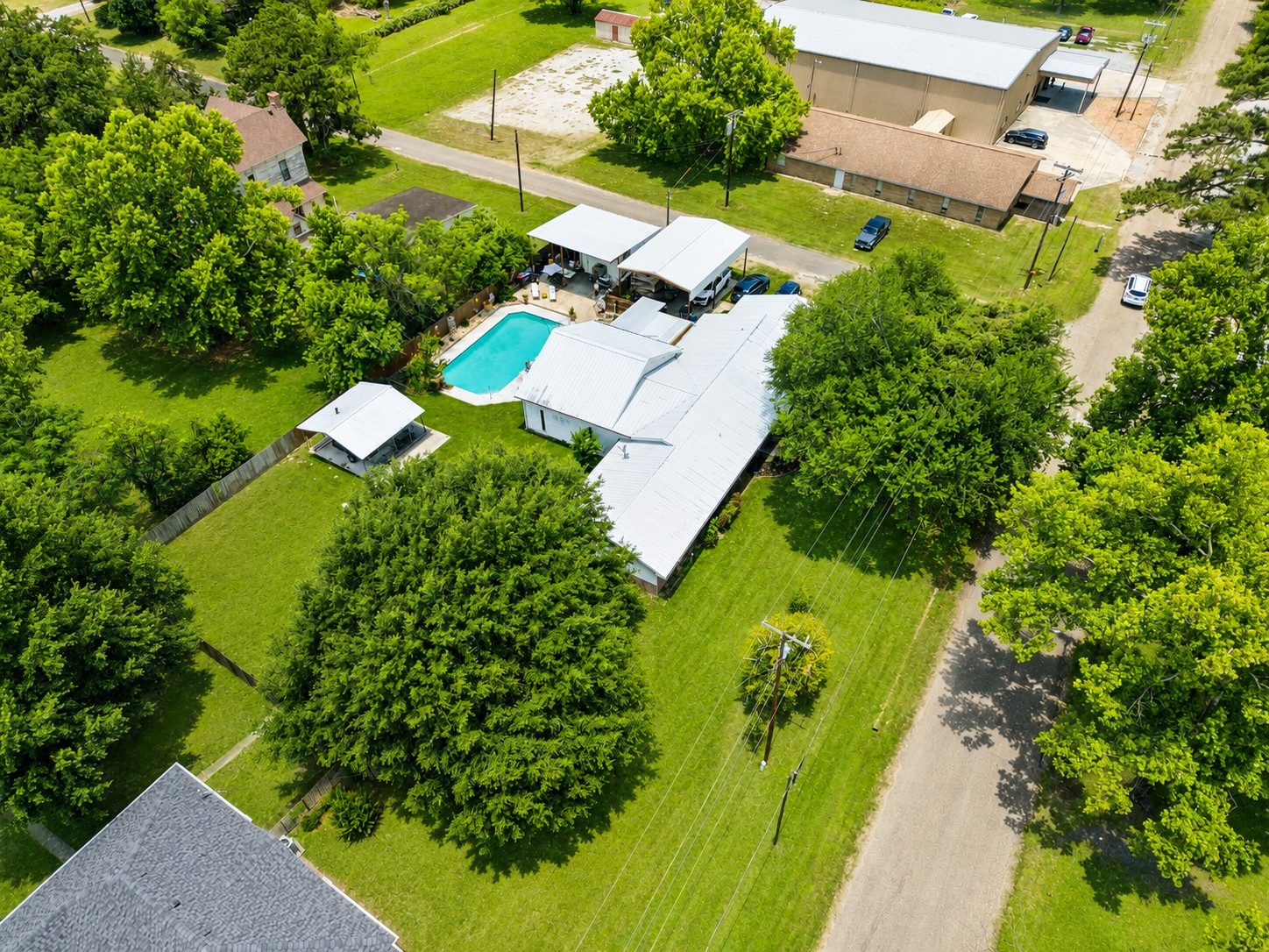 416 Division Street Jewett, TX 75846 - Photo 38 of 38 an aerial view of a house with a yard basket ball court and outdoor seating