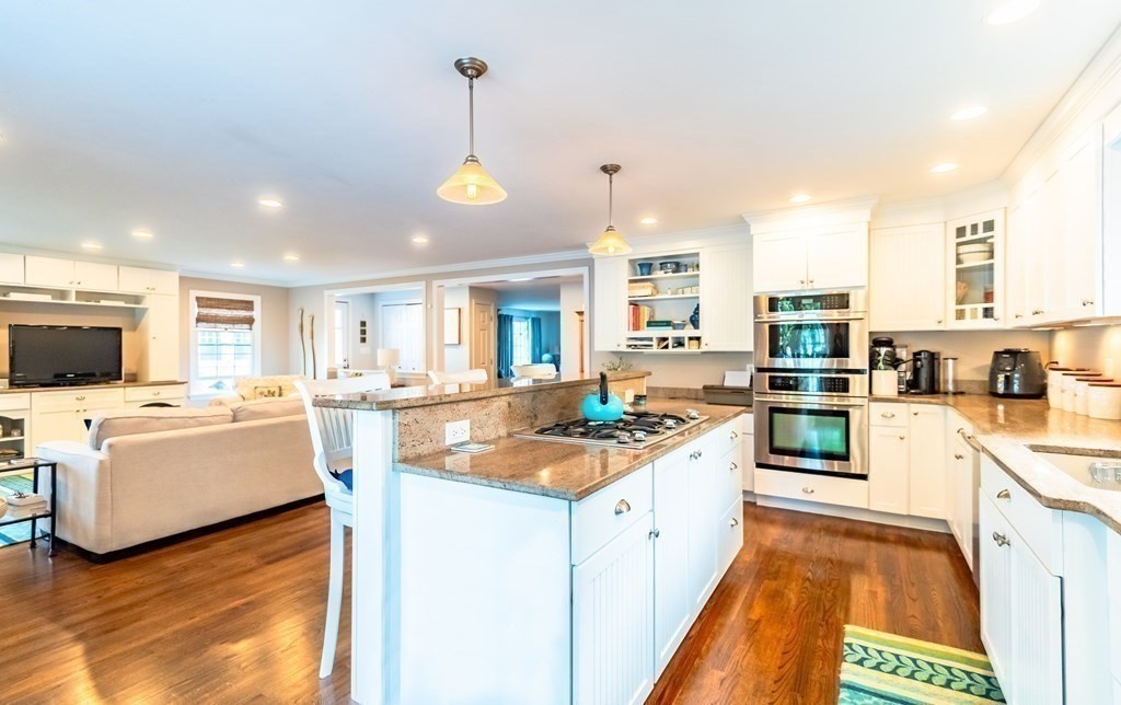 18 Damon Road Scituate, MA 02066 - Photo 4 of 25 a kitchen with a stove oven and white cabinets