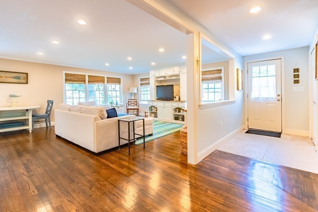18 Damon Road Scituate, MA 02066 - Photo 7 of 25 a living room with furniture and a wooden floor