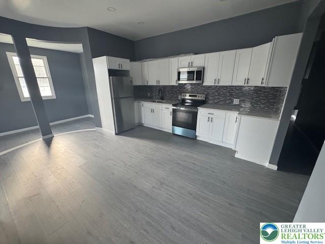 116 East Ridge Street, Unit 1 Coaldale, PA 18218 - Photo 4 of 7 a kitchen with stainless steel appliances a refrigerator sink and microwave