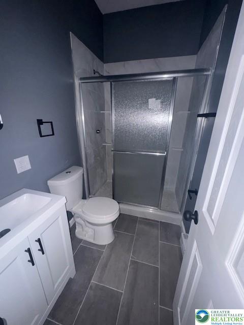 116 East Ridge Street, Unit 1 Coaldale, PA 18218 - Photo 5 of 7 a white toilet sitting next to a shower