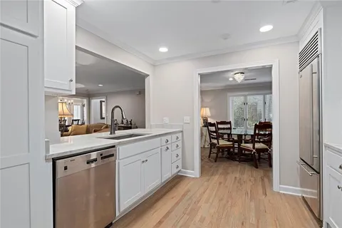 a bedroom with a bed and a fireplace