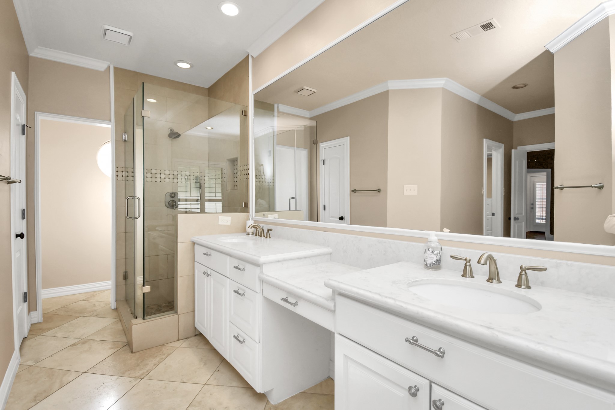 4411 Walham Court Houston, TX 77345 - Photo 34 of 46 a bathroom with a granite countertop sink mirror and double