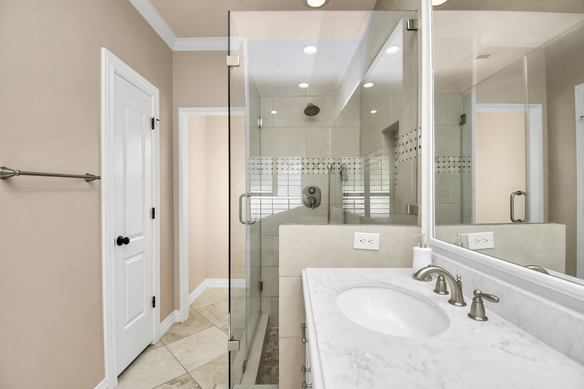 4411 Walham Court Houston, TX 77345 - Photo 36 of 46 a bathroom with a sink a toilet and shower