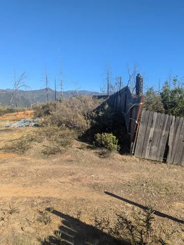 a view of yard covered with snow