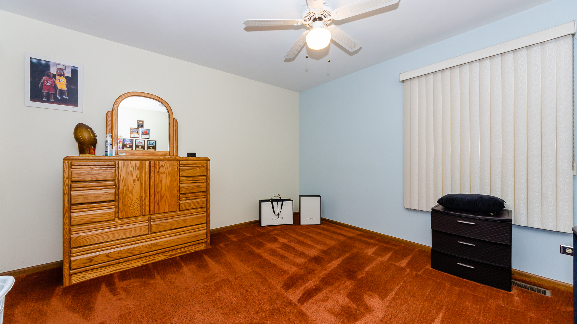940 Gannon Drive Hoffman Estates, IL 60169 - Photo 12 of 20 a bedroom with a bed and a dresser