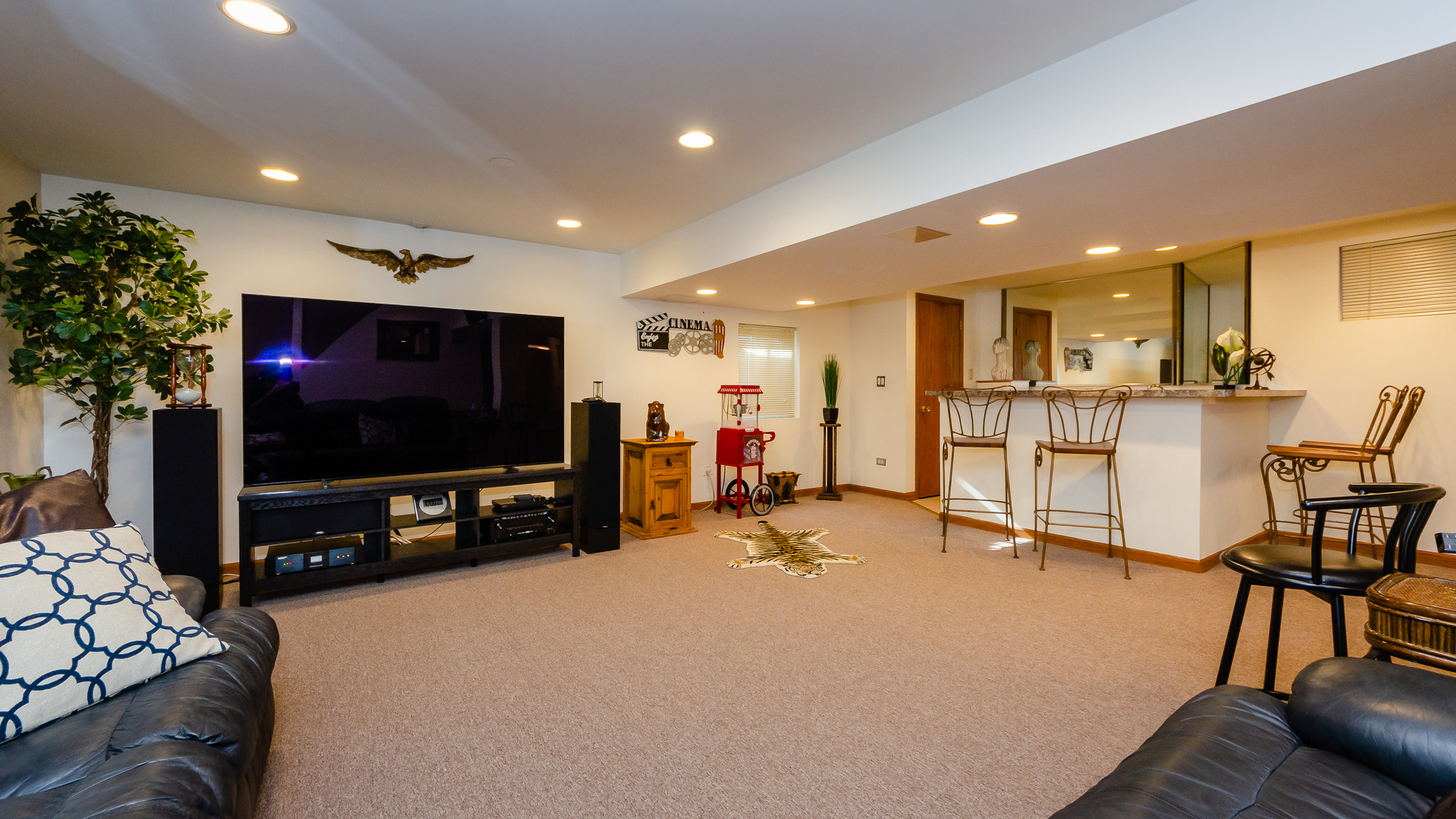 940 Gannon Drive Hoffman Estates, IL 60169 - Photo 18 of 20 a living room with furniture and a flat screen tv