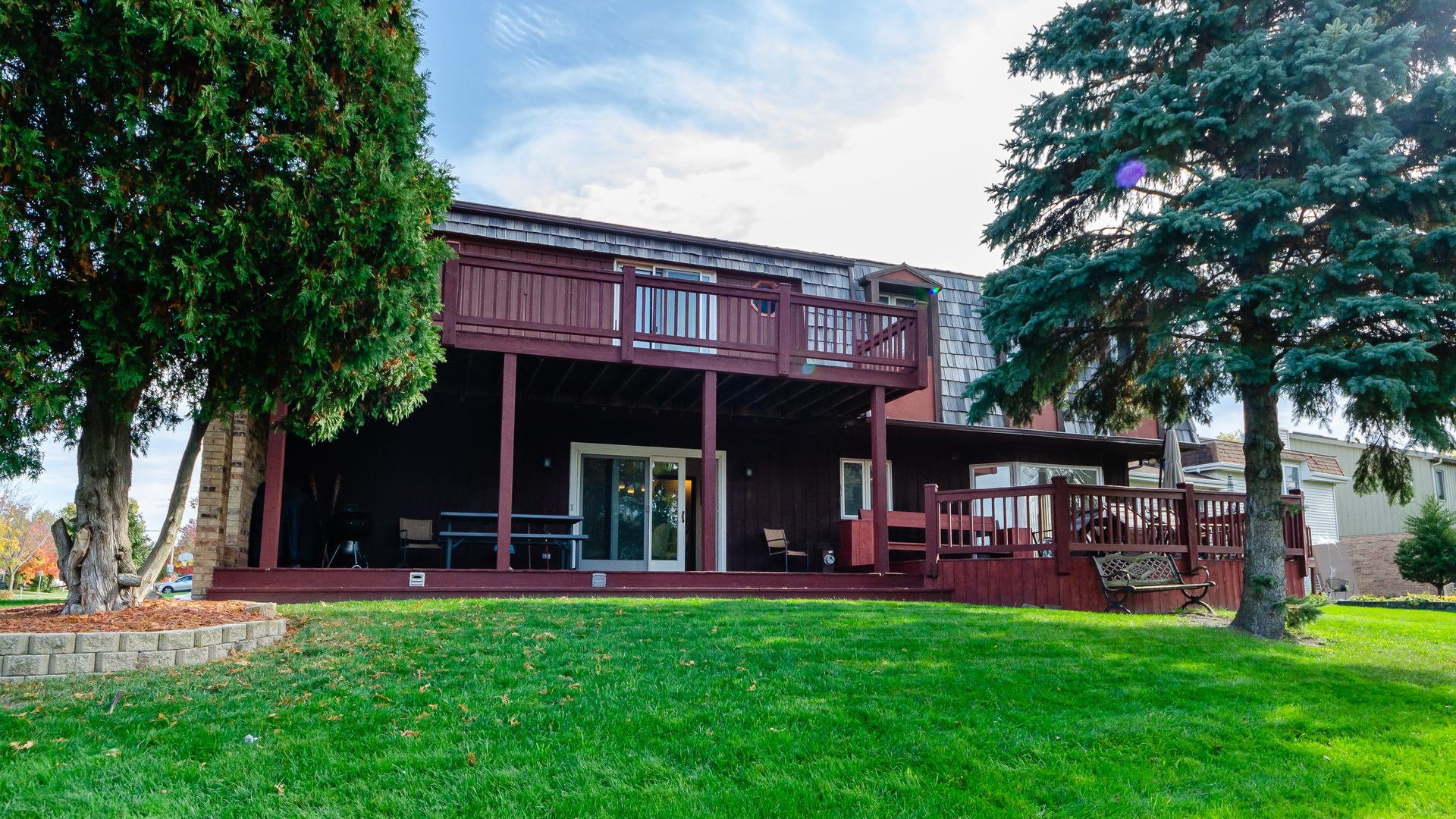 940 Gannon Drive Hoffman Estates, IL 60169 - Photo 2 of 20 a view of a cafe with a table and chairs under an umbrella