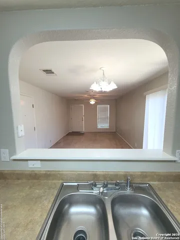 a view of a room with a chandelier