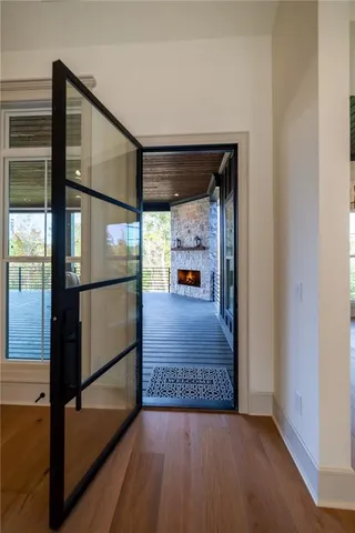 a view of hallway with a large window