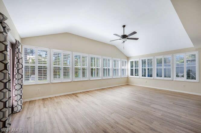 778 Broad Court South Naples, FL 34102 - Photo 20 of 36 a view of an empty room with wooden floor and a window