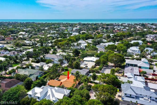 778 Broad Court South Naples, FL 34102 - Photo 2 of 36 an aerial view of residential houses with outdoor space and trees