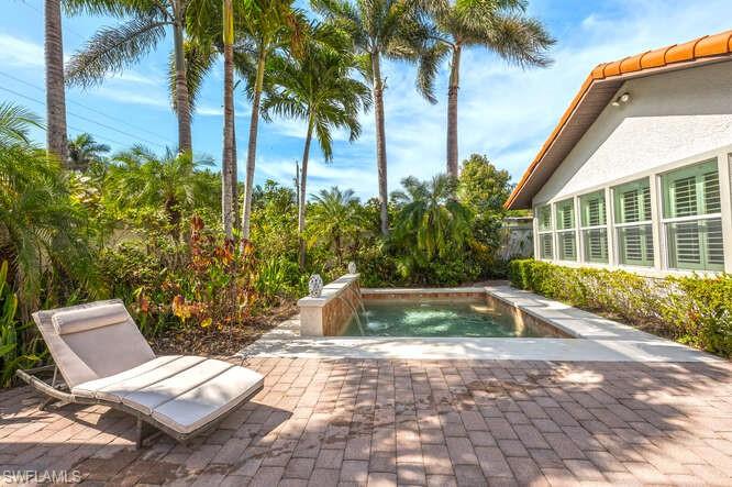 778 Broad Court South Naples, FL 34102 - Photo 31 of 36 a view of outdoor space yard and patio