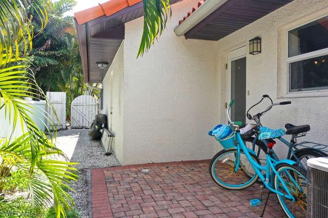 778 Broad Court South Naples, FL 34102 - Photo 35 of 36 a front view of a house with patio