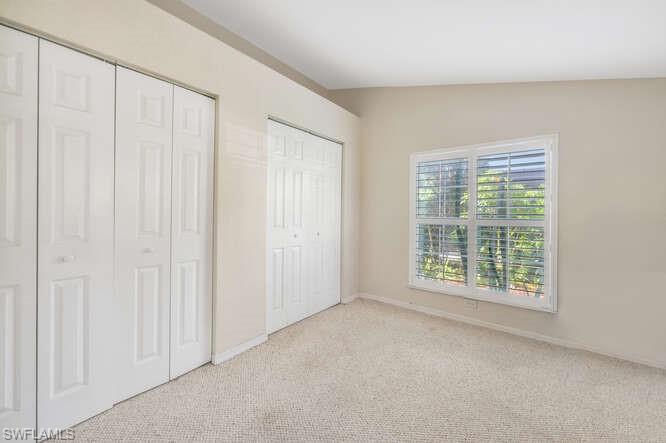 778 Broad Court South Naples, FL 34102 - Photo 10 of 36 an empty room with a window