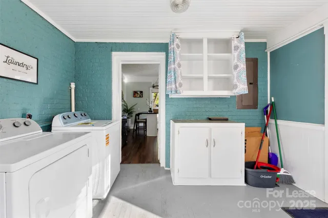 a utility room with dryer and washer