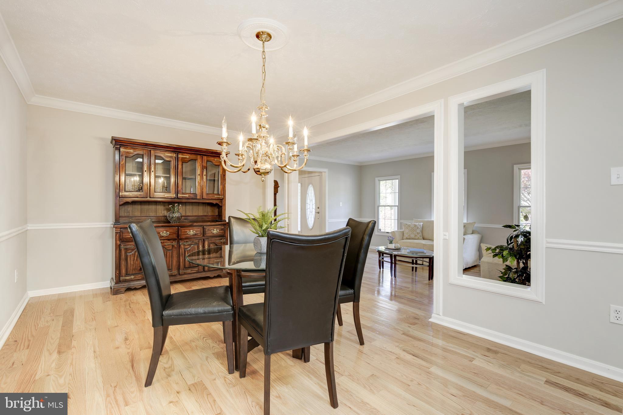 31 Rutherford Circle Sterling, VA 20165 - Photo 16 of 94 Formal Dining Room and Living Room