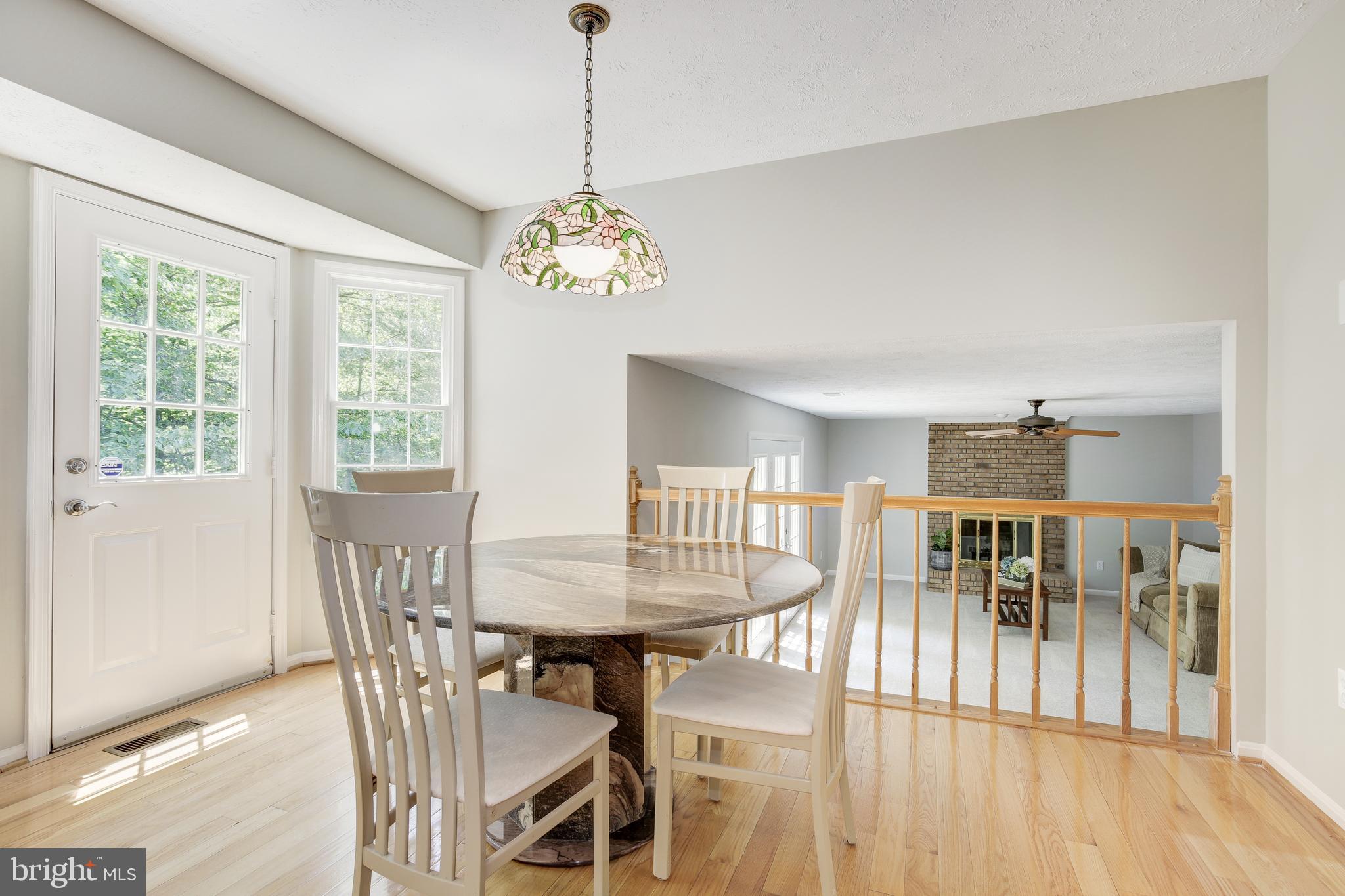31 Rutherford Circle Sterling, VA 20165 - Photo 29 of 94 Eat-in Kitchen and View of Family Room