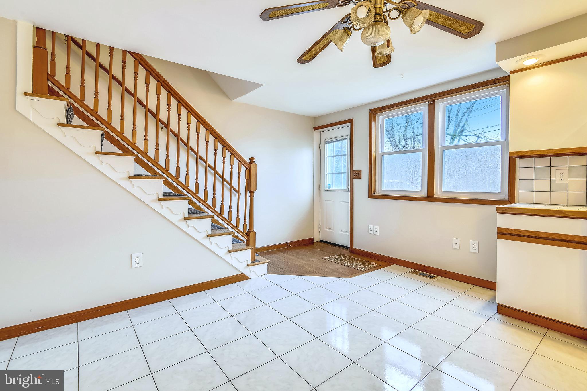 8025 Lansdale Road Baltimore, MD 21224 - Photo 19 of 36 "Back Door" stairs to upper level