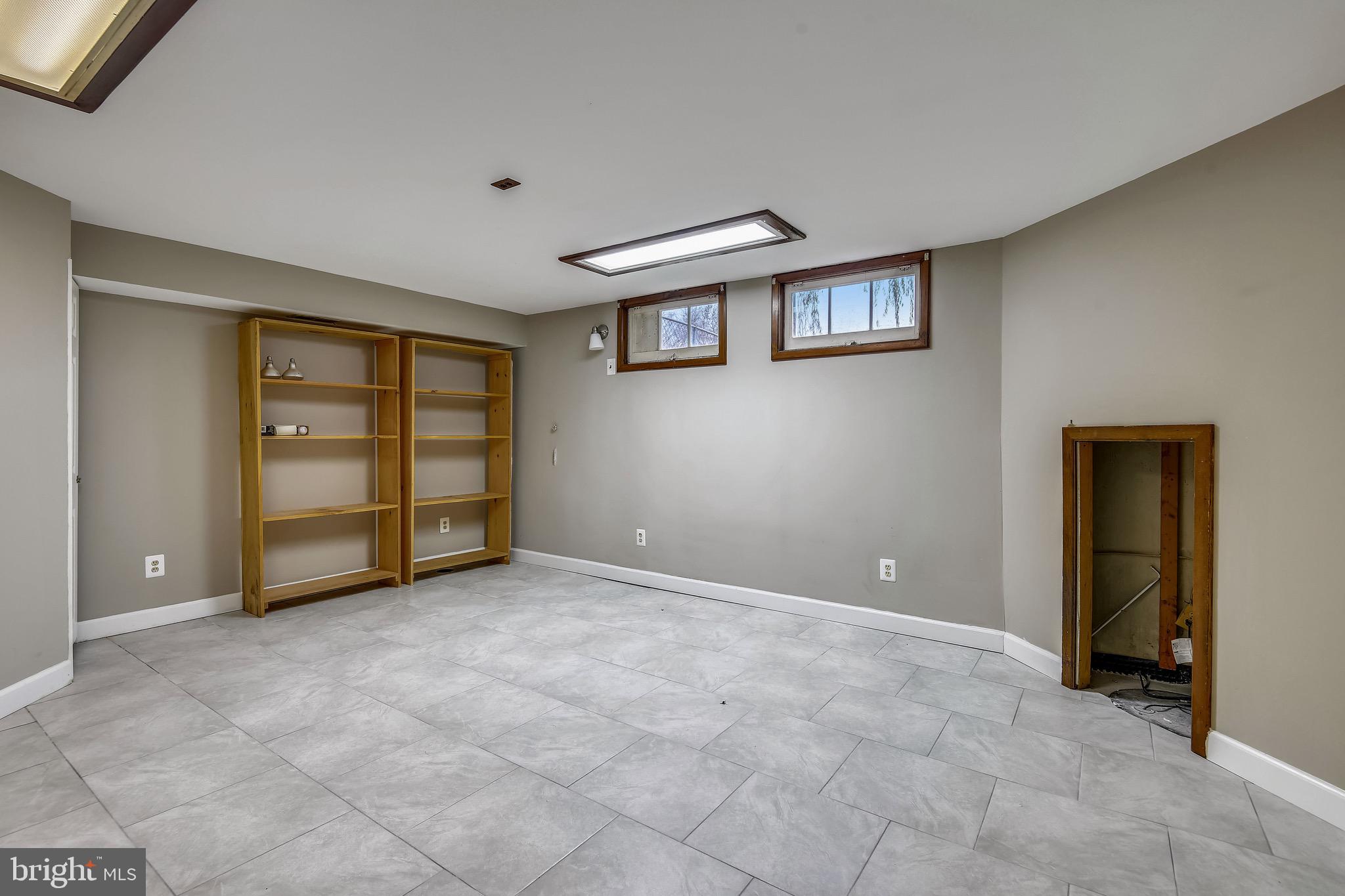 8025 Lansdale Road Baltimore, MD 21224 - Photo 29 of 36 Lower Level Rec room