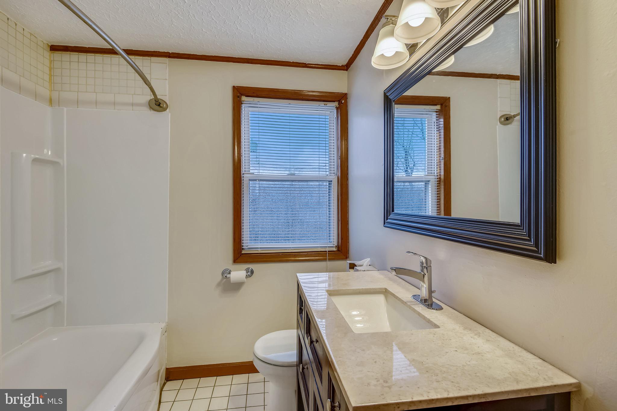 8025 Lansdale Road Baltimore, MD 21224 - Photo 4 of 36 Upper Level Bath