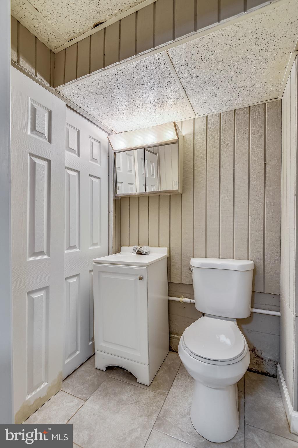 8025 Lansdale Road Baltimore, MD 21224 - Photo 33 of 36 Lower Level half bath