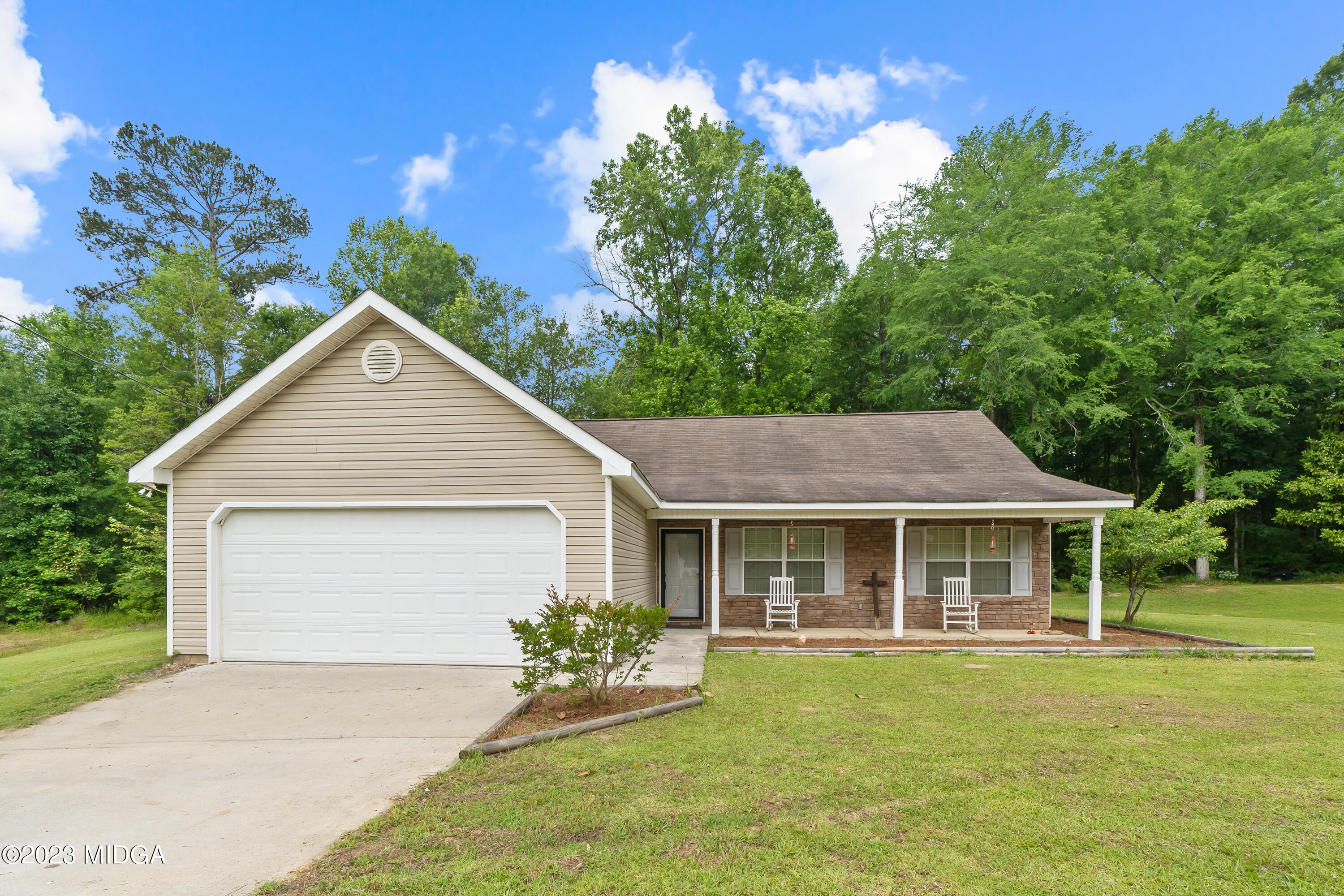 259 Autumn Ridge Court Gray, GA 31032 - Photo 1 of 18 a front view of house with yard and green space