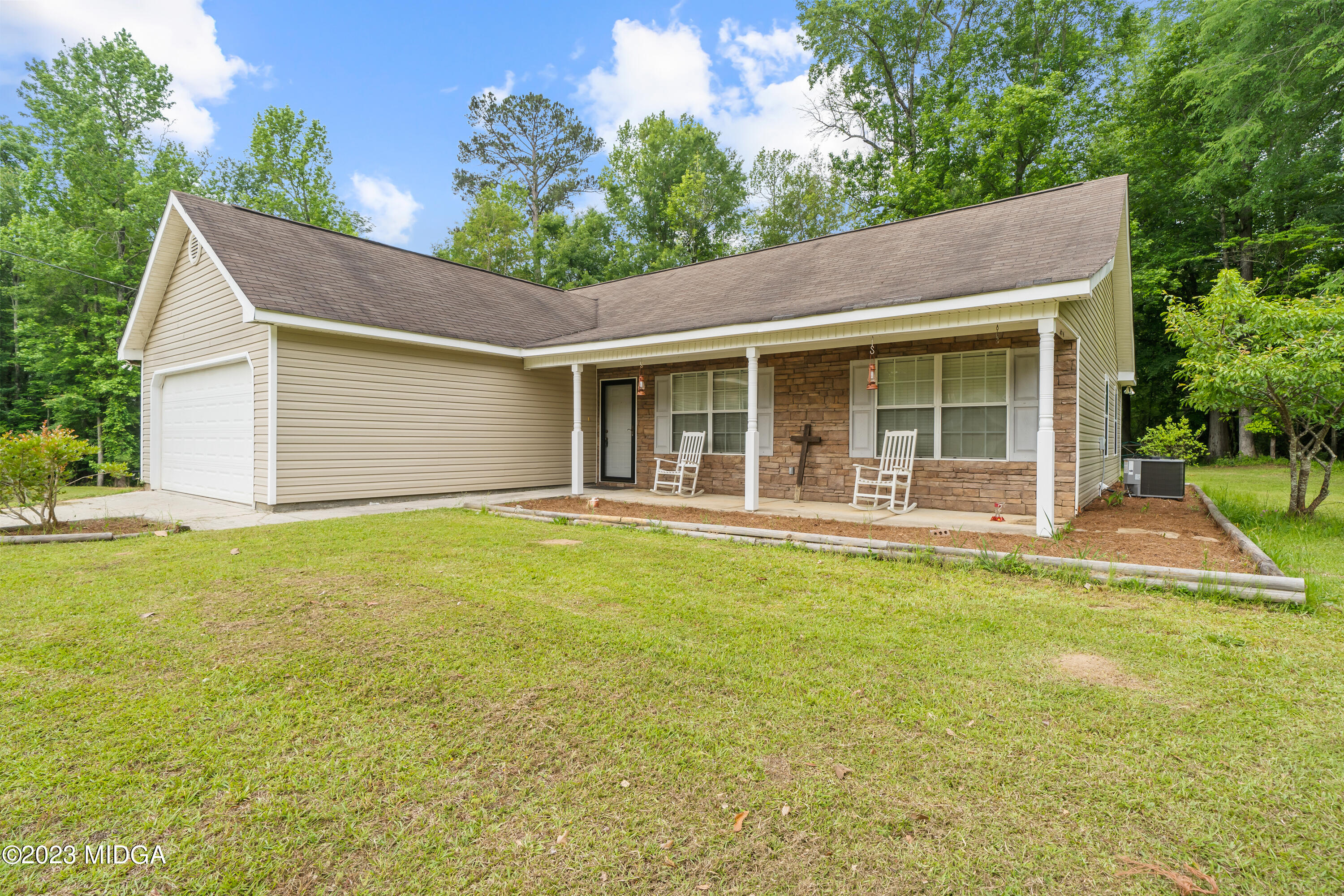 259 Autumn Ridge Court Gray, GA 31032 - Photo 3 of 18 a view of a house with pool and a yard