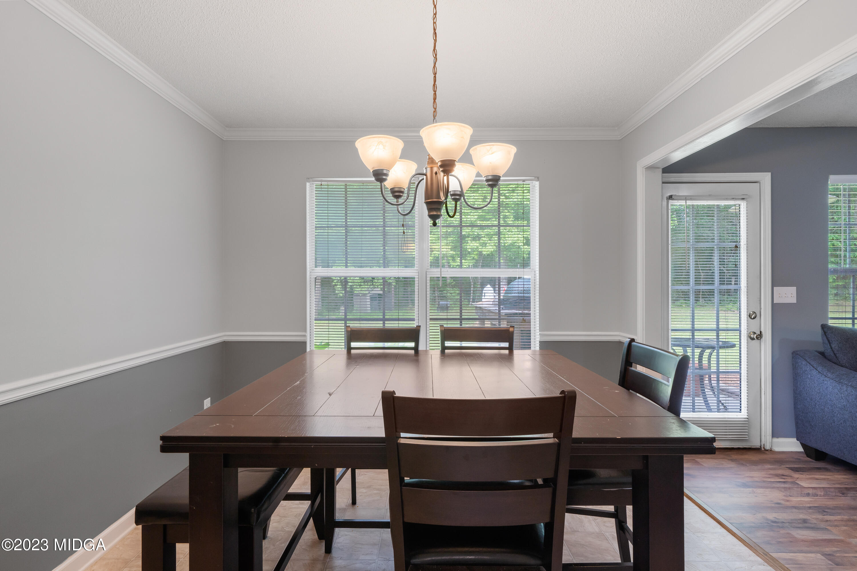 259 Autumn Ridge Court Gray, GA 31032 - Photo 9 of 18 a view of a dining room with furniture and wooden floor