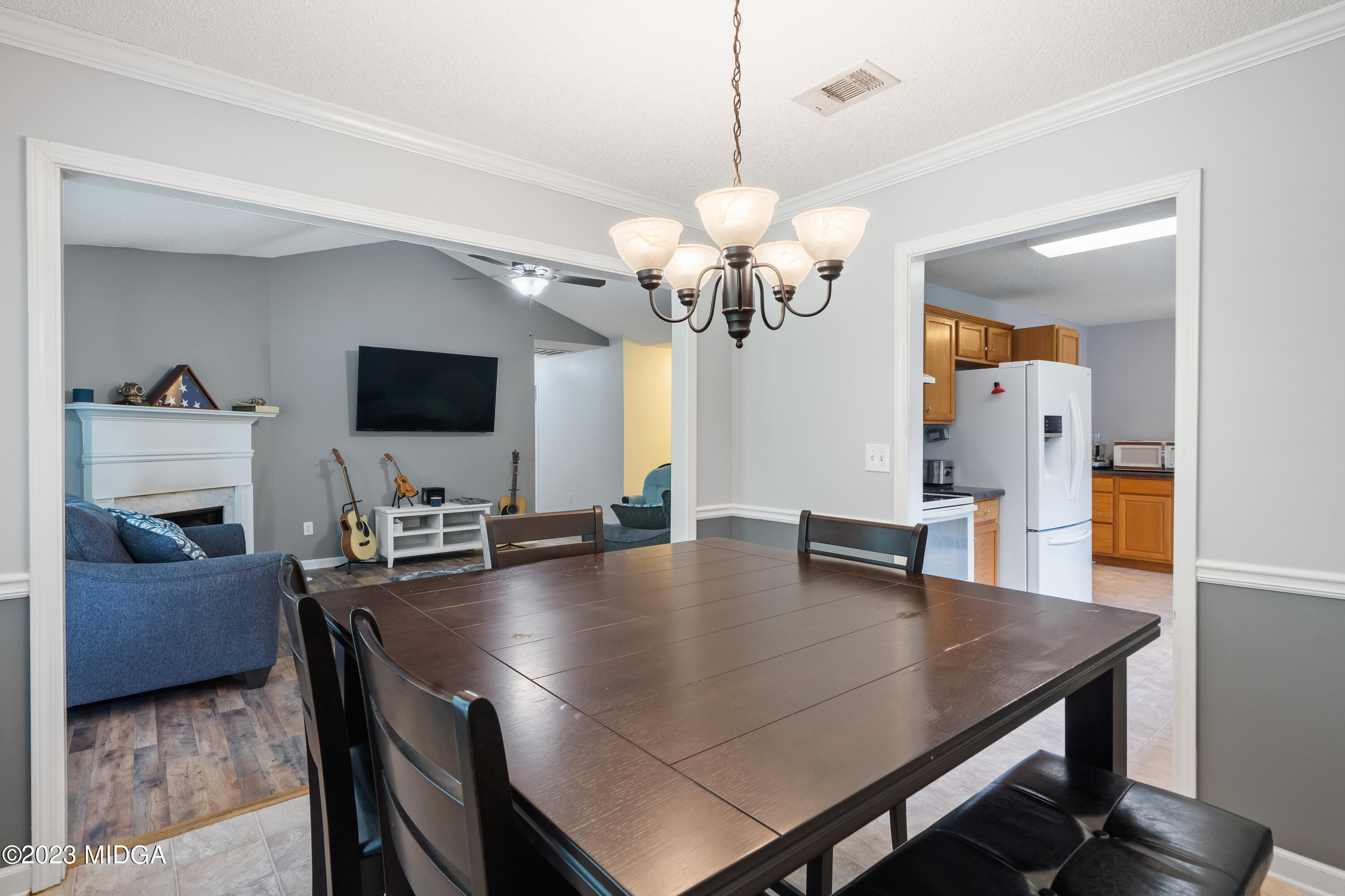 259 Autumn Ridge Court Gray, GA 31032 - Photo 10 of 18 a view of a dining room with furniture and wooden floor