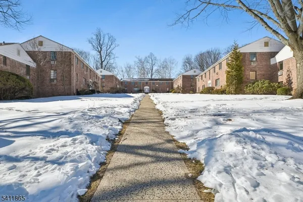 a view of a yard with a house
