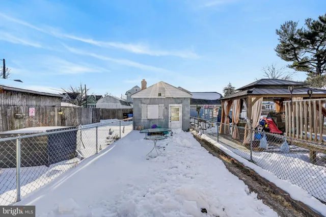 a view of a house with sitting area and furniture