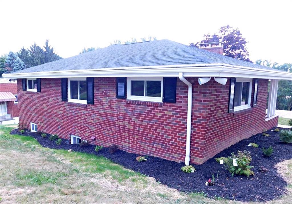 26 Porters Hollow Road Coraopolis, PA 15108 - Photo 4 of 25 Side view with fresh landscaping