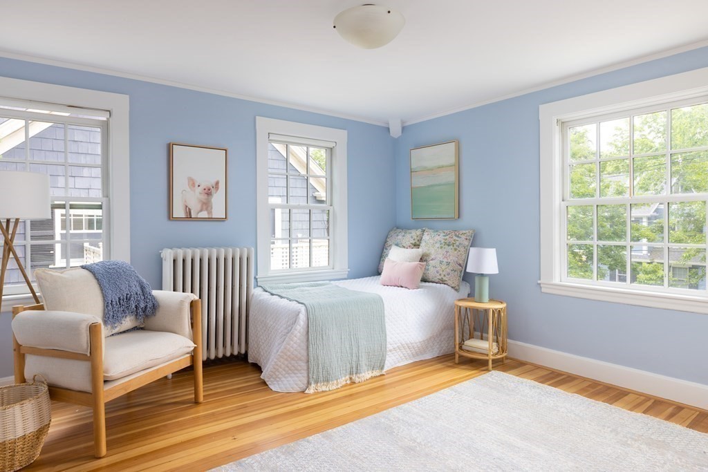 43 Somerset Road Brookline, MA 02445 - Photo 12 of 18 a bedroom with a bed and a window