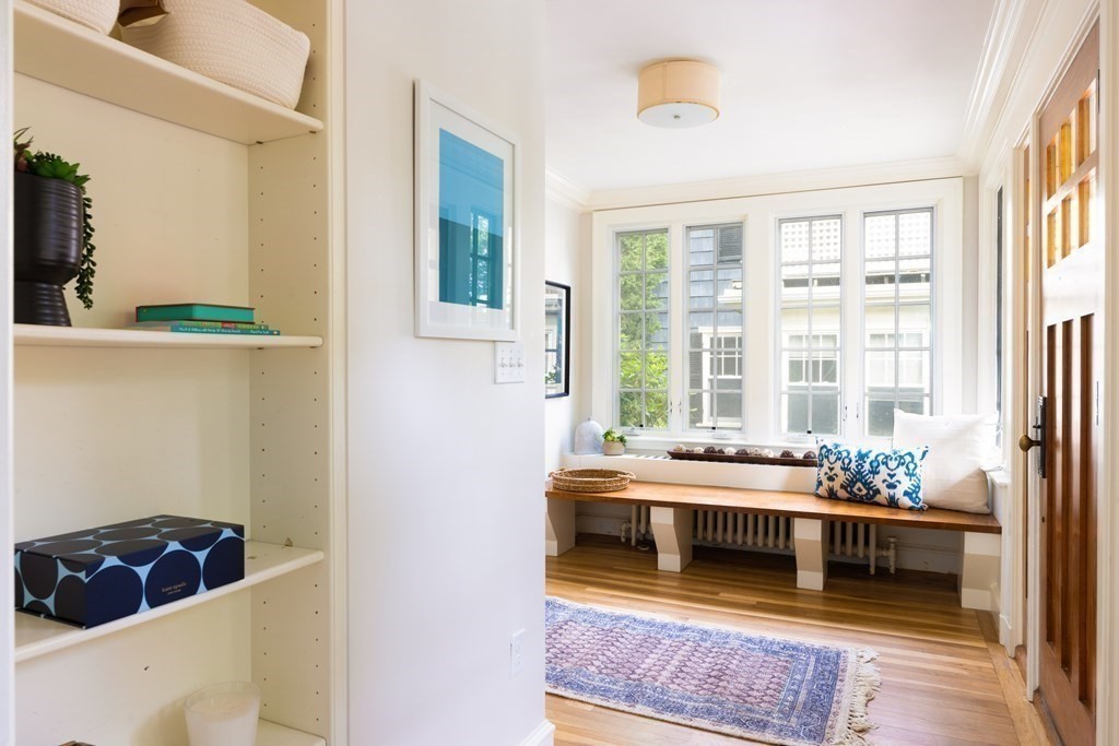 43 Somerset Road Brookline, MA 02445 - Photo 3 of 18 a spacious bedroom with a bed and a window