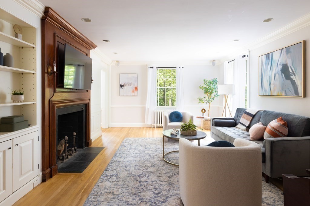 43 Somerset Road Brookline, MA 02445 - Photo 6 of 18 a living room with furniture and a fireplace