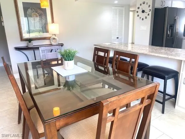 a view of kitchen with cabinets and wooden floor