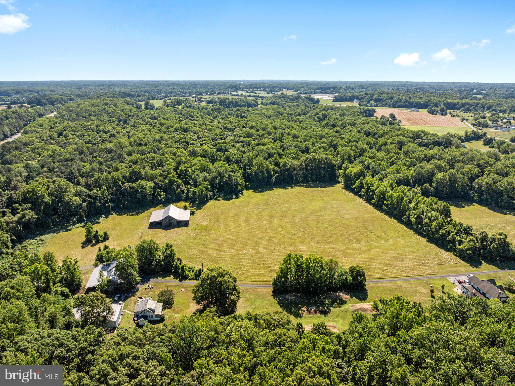 1524 Governor Bridge Road Davidsonville, MD 21035 - Photo 10 of 28 Back field with 2 barns and addt'l storage bldg