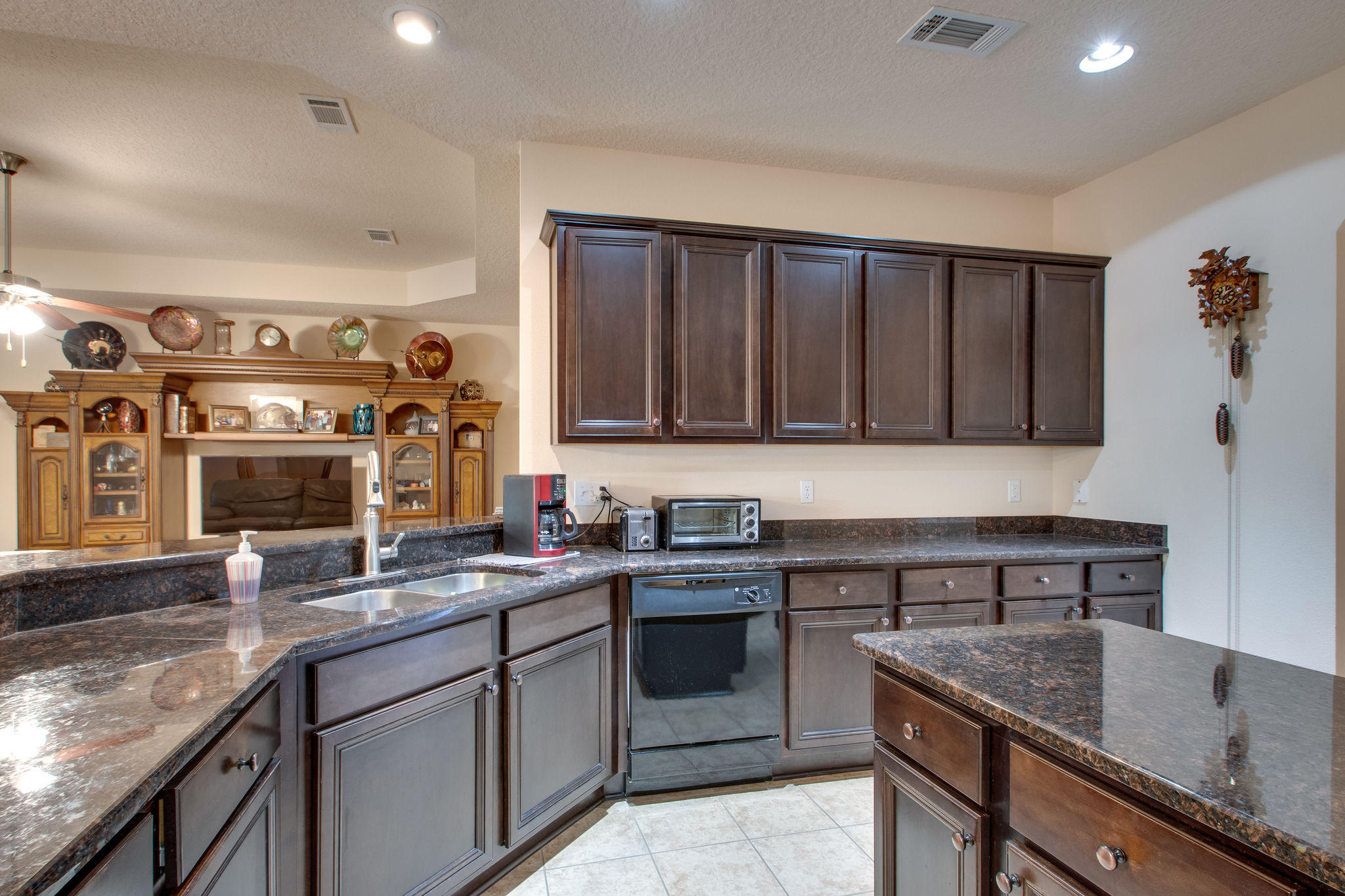 446 Mango Lane Freeport, FL 32439 - Photo 15 of 48 a kitchen with a sink stove and cabinets