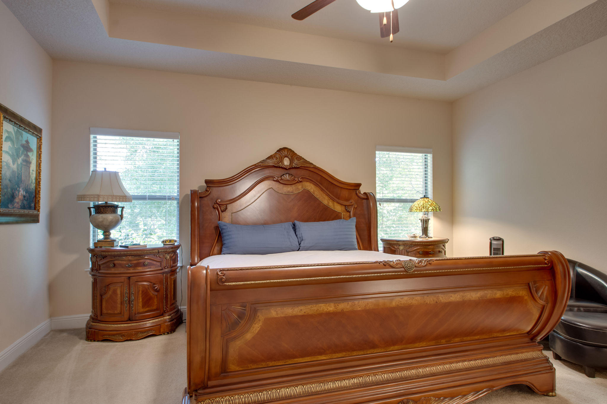 446 Mango Lane Freeport, FL 32439 - Photo 21 of 48 a room with a bed and a chandelier