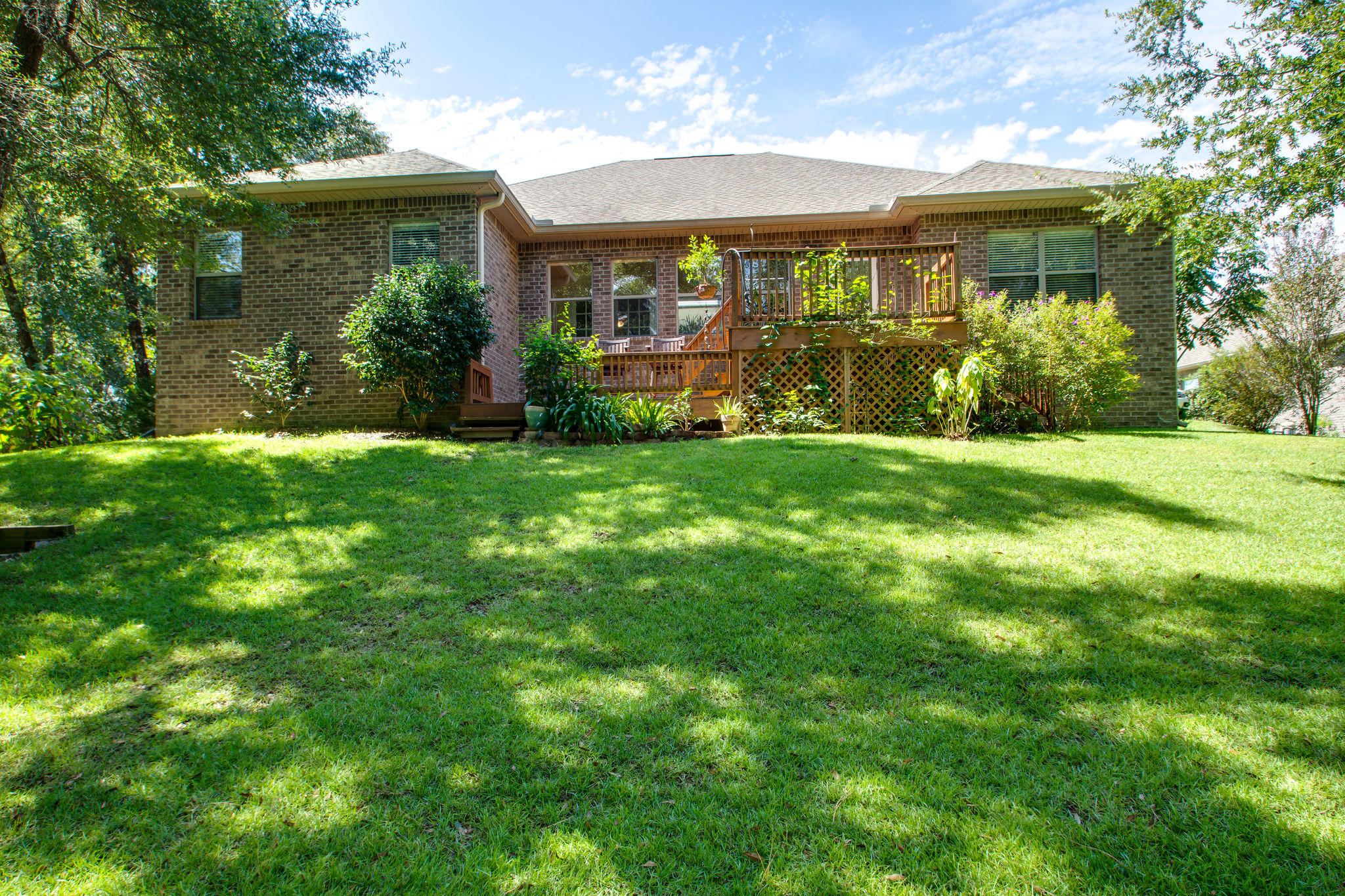 446 Mango Lane Freeport, FL 32439 - Photo 30 of 48 a view of a house with a garden